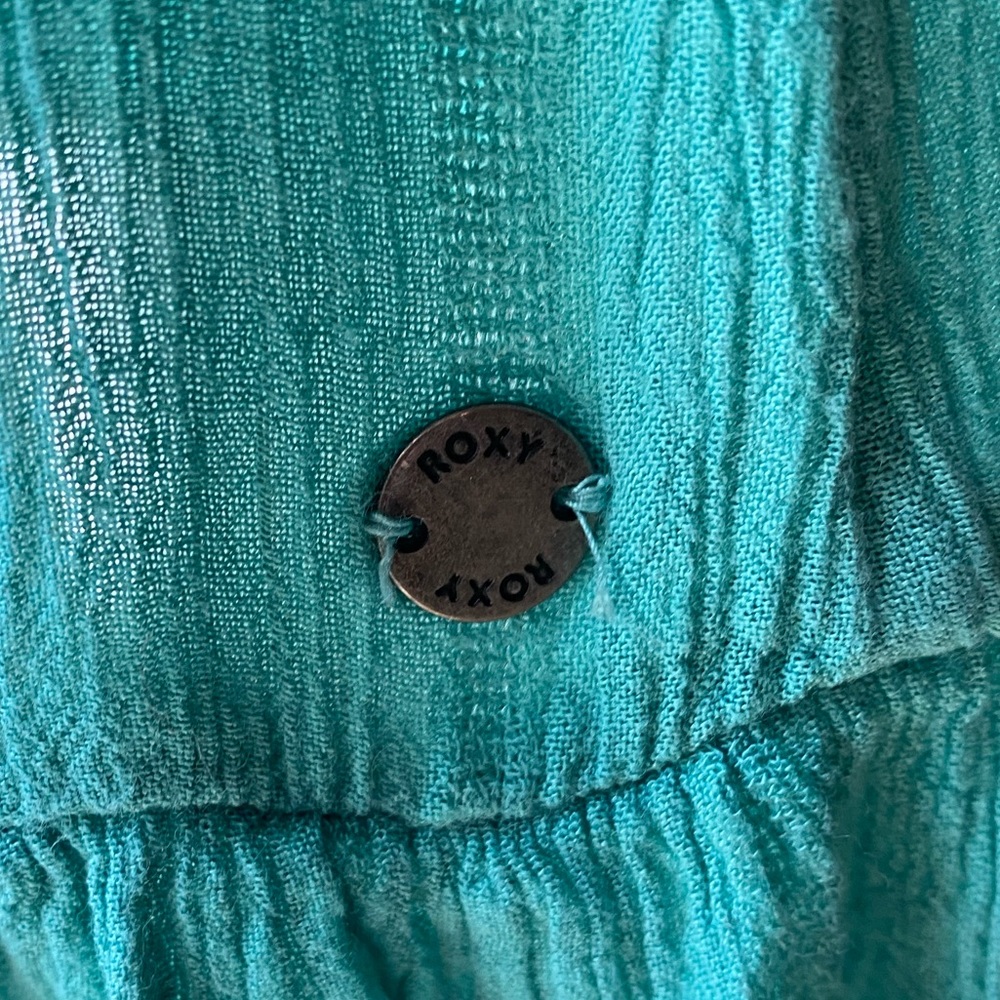 Super flattering and cute teal mini dress.